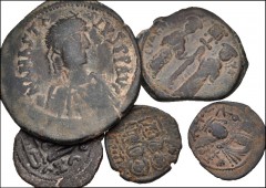 BYZANTINE. Lot of five (5) Æ Folles and Pseudo-Byzantine Islamic Falus. Includes: BYZANTINE. Anastasius I. Æ Follis. Ex E-331, lot 357 // Justin II. Æ Half Follis. Ex E-331, lot 370 // Constantine X D