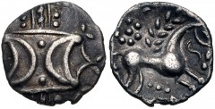 CELTIC, Iceni. Anted. Circa AD 1-25. AR Unit (14mm, 1.07g). Two outline crescents back-to-back on a central band; two pellets between / Celticized horse right; ‘daisy’ above, pellets and monogram belo