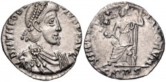 Theodosius I. AD 379-395. AR Siliqua (16mm, 1.47 g, 7h). Treveri (Trier) mint. Struck AD 388-395. Pearl-diademed, draped, and cuirassed bust right / Roma seated left on cuirass, holding crowning Victo