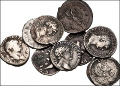 ROMAN. Imperial. Lot of ten (10) silver coins. All denarii unless otherwise noted. Includes: Titus // Domitian // Trajan (3) // Hadrian (2) // Julia Paula // Severus Alexander // Theodosius I. Siliqua