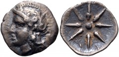 CRETE, Itanos. Circa 320-270 BC. AR Obol (12mm, 0.71 g). Helmeted head of Athena left / Star with eight rays. Svoronos, Numismatique 39; SNG Copenhagen 477. VF, toned, a few deposits, struck with worn