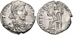 Theodosius I. AD 379-395. AR Siliqua (16mm, 1.57 g, 12h). Treveri (Trier) mint. Struck AD 388-395. Pearl-diademed, draped, and cuirassed bust right / Roma seated left on cuirass, holding crowning Vict