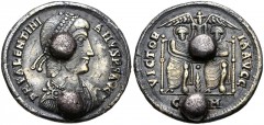 Valentinian II. AD 375-392. AR ‘Solidus’ (20mm, 4.30 g, 12h). Base silver imitation of a western mint solidus. Uncertain mint. Pearl-diademed, draped, and cuirassed bust right / Two emperors seated fa