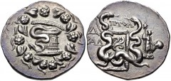LYDIA, Tralleis. Circa 166-67 BC. AR Tetradrachm (27mm, 12.56 g, 1h). Cistophoric type. Ptol-, magistrate. Dated CY 4 (130 BC). Cista mystica with serpent; all within ivy wreath / Two serpents entwine
