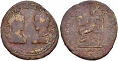 LYDIA, Philadelphia. Caracalla & Geta. AD 209-211. Æ (38mm, 27.04 g, 7h). Confronted busts of Caracalla right and Geta left, both laureate, draped, and cuirassed / Syncretic deity seated left, wearing