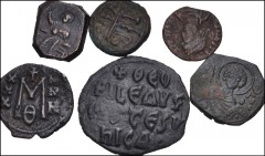 BYZANTINE. Lot of sixteen (16) bronzes, mixed denominations. Includes: Anastasius I (1 coin) // Phocas (2 coins) // Heraclius (1 coin) // Constantine IV (1 coin) //Leo III (1 coin) // Leo VI (2 coins)