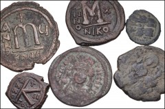 BYZANTINE. Early Empire. Lot of eleven (11) Æ denominations. Includes: Mostly follis issues of Justin II, although a half follis and two decanummium issues are included (8 coins total). Lot also inclu