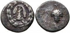 LYDIA, Tralleis. Circa 166-67 BC. AR Drachm (16mm, 2.94 g, 12h). Cistophoric series. Lion’s skin draped over club; all within ivy wreath / Grape bunch on vine; uncertain symbol(s). Cf. SNG Copenhagen 