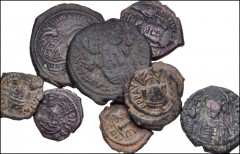 BYZANTINE. Lot of nine (9) mixed bronzes. Includes: Æ Follis, Antioch mint (2 coins) // Æ Half Follis, Nicomedia mint (2 coins) // Æ Decanummium, Constantinople mint (5 coins). Fine to VF, mostly with