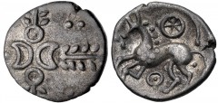 CELTIC, Iceni. Uninscribed. Early-mid 1st century AD. AR Unit (13mm, 1.17 g). Crescent Corn Ears (Icenian F) type. Devolved head of Apollo right, with wreath in cross shape and opposed crescents and a