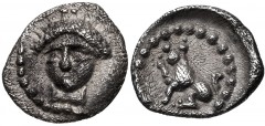 LYCIA, Tlos. 4th century BC. AR Hemiobol (7.3mm, 0.25 g, 8h). Head of Apollo facing slightly left / Lion sitting left. Unpublished in the standard references. VF, toned, granular surfaces. Extremely r