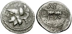 APULIA, Arpi. Circa 215-212 BC. AR Diobol (1.27 gm). Estimate $250 APULIA, Arpi. Circa 215-212 BC. AR Diobol (1.27 gm). Head of Athena left, wearing crested Corinthian helmet / Two conjoined grain ear