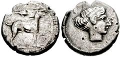 SICILY, Segesta. Circa 480-461 BC. AR Didrachm (8.34 gm). Estimate $300 SICILY, Segesta. Circa 480-461 BC. AR Didrachm (8.34 gm). Hound standing right; barley grain above / Head of the nymph Segesta r