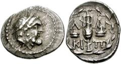 LAKONIA, Lakedaimon (Sparta). Circa 219-196 BC. AR Triobol (2.35 gm). Estimate $200 LAKONIA, Lakedaimon (Sparta). Circa 219-196 BC. AR Triobol (2.35 gm). Laureate head of Zeus right / Amphora; caps of