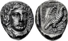 CARIA, Halikarnassos. Circa 400-387 BC. AR Tetradrachm (21.5mm, 15.24 g, 12h). Head of Apollo, wearing laurel wreath, facing slightly right / Eagle standing half-right, wings spread; AΛIKAPNAΣΣ-EΩN ar