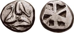 PHLIASIA, Phlius. Circa 6th Century BC. AR Didrachm (7.13 gm). Estimate $10000 PHLIASIA, Phlius. Circa 6th Century BC. AR Didrachm (7.13 gm). F, triskeles running clockwise / Incuse square divided int