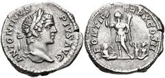 Caracalla. AD 198-217. AR Denarius (19mm, 3.28 g, 6h). Rome mint. Struck AD 207. Laureate head right / Caracalla standing facing, head right, holding reversed spear and parazonium; at feet to left, ri