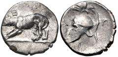ARGOLIS, Argos. Circa 330-270 BC. AR Trihemiobol (12mm, 0.97 g, 3h). Wolf at bay left; archaic heta above / Crested Corinthian helmet left; A-P flanking. BCD Peloponnesos 1096; HGC 5, 673. VF, toned, 