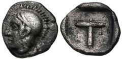 ARKADIA, Tegea. Circa 423-400 BC. AR Tetrartemorion (6mm, 0.27 g, 8h). Helmeted head of Athena left / T (mark of value) within incuse square. BCD Peloponnesos 1721; HGC 5, 1054. VF, toned, some porosi