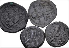 BYZANTINE. Lot of four (4) Æ Folles. Includes: Justin II & Sophia. Æ Follis. Nicomedia mint // Anonymous. Æ Follis (3 coins). Fine to VF, mostly with patinas, Justin II with bronze disease. LOT SOLD A