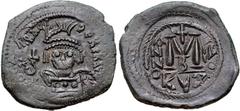 Byzantine Heraclius. 610-641. Æ Follis (31mm, 12.45 g, 12h). Cyzicus mint, 2nd officina. Dated RY 2 (AD 611/2). Helmeted, diademed, and cuirassed facing bust, holding cross and shield / Large M; cross