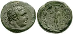 LYDIA, Sardis. 2nd-1st centuries BC. Æ 18mm (5.21 gm). Heraois, magistrate. Laureate head of Herakles right / Apollo standing left, holding bird and olive-branch; monogram left; all within wreath. SNG