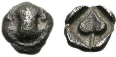 BOIOTIA, Thebes. Circa 450-425 BC. AR Tetartemorion (0.15 g). Boiotian shield / Ivy leaf oriented diagonally within square incuse. Bérend, Réflexions 24 (this coin). Near VF, even grey tone, slight gr