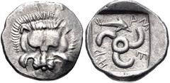 Greek DYNASTS of LYCIA. Mithrapata. Circa 390-370 BC. AR Sixth Stater (13mm, 1.54 g). Phellos(?) mint. Facing lion scalp / Triskeles; dolphin in one section; all within incuse square. Müseler VII 76–7