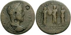 LYDIA, Thyatira. Commodus. 177-192 AD. Æ 45mm Medallion (40.76 g). Laureate, draped and cuirassed bust right; c/m's: VO monogram in incuse circle, grape cluster in incuse circle / The Capitoline Triad