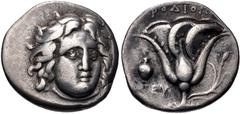 Greek ISLANDS off CARIA, Rhodos. Rhodes. Circa 305-275 BC. AR Didrachm (20mm, 6.50 g, 12h). Head of Helios facing slightly right / Rose with bud to right; jug and EY to left. Ashton 160; HGC 6, 1435. 
