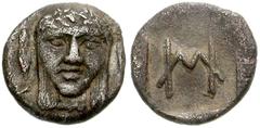 IONIA, Kolophon. Circa 450-410 BC. AR Hemiobol (8mm, 0.48 g). Laureate, facing head of Apollo; laurel-leaf on either side / HE (hemiobol) monogram in incuse square. Milne, Colophon 5; SNG Copenhagen -