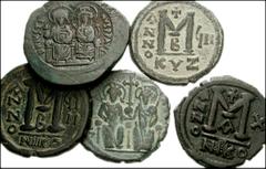 BYZANTINE. Lot of five Byzantine Æ of Justin II. Æ Follis. Constantinople mint. RY 1. SB 360 // Æ Follis. Nicomedia mint. RY 9. SB 369 // Æ Follis. Nicomedia mint. RY 10. SB 369 // Æ Follis. Cyzicus m
