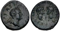 Roman Provincial UNCERTAIN. Vespasian, with Titus and Domitian as Caesars. AD 69-79. Æ (17mm, 3.94 g, 12h). VESPASIANO [AVG], laureate head of Vespasian right / TITO E[T] DOMITIANO CAES, confronted ba