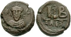 Heraclius. 610-641. Æ 12 Nummi (21mm, 11.70 g, 6h). Alexandria mint. Circa 618-628. Cuirassed bust facing (of Khusru II?), crown with simple cross; to left, star, to right, crescent / Large IB, cross 