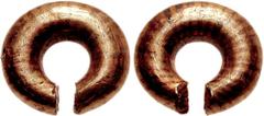 CELTIC, Britain. Ring money. 1st millennium BC. AV 18mm diameter (9.62 g). Smooth ring of gold with blunt ends and black-brown colored bands. Van Arsdell 1-3; Pudill & Eyre, The Tribes & Coins of Celt
