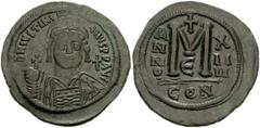 Justinian I. 527-565. Æ Follis (42mm, 22.08 g). Constantinople mint. Dated RY 14 (540/1). Crowned and cuirassed facing bust, holding globus cruciger and shield; cross in right field / Large M, cross a