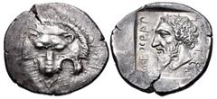 Greek DYNASTS of LYCIA. Mithrapata. Circa 390-370 BC. AR Stater (25mm, 9.89 g, 7h). Facing lion scalp; triskeles below / Head of Mithrapata left; name (in Lycian) around, triskeles to lower right; all
