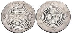 Early Medieval & Islamic ISLAMIC, Umayyad Caliphate. 'Atiya ibn al-Aswad. Kharijite (Azarqite) governor in Kirman, circa AH 70-77 / AD 689-697. AR Drachm (30.5mm, 3.75 g, 3h). Arab-Sasanian type. KRMA