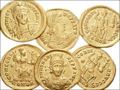 ROMAN. Imperial. AV of 5th century AD. Includes: all AV solidi. Honorius. Ravenna. Diademed bust right / Honorius standing right, stepping on captive. RIC X 1287 // Same. Constantinople. Helmeted bust