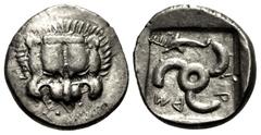 Greek DYNASTS of LYCIA. Mithrapata. Circa 390-370 BC. AR Sixth Stater (12mm, 1.49 g). Phellos(?) mint. Facing lion scalp / Triskeles; dolphin in one section; all within incuse square. Müseler VII 76–7