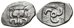 Greek DYNASTS of LYCIA. Mithrapata. Circa 390-370 BC. AR Sixth Stater (15mm, 1.53 g). Phellos(?) mint. Lion scalp facing / Triskeles; dolphin in one section; all within incuse square. Müseler VII 76–7