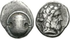BOEOTIA, Thebes. Circa 425-395 BC. AR Stater (12.06 g). Later style. Boeotian shield, club across upper half / Bearded head of Dionysos right, wearing ivy wreath; all within concave incuse. BCD Boioti
