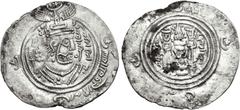 Early Medieval & Islamic ISLAMIC, Umayyad Caliphate. 'Atiya ibn al-Aswad. Kharijite (Azarqite) governor in Kirman, circa AH 70-77 / AD 689-697. AR Drachm (32mm, 3.70 g, 6h). Arab-Sasanian type. KRMAN-