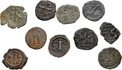 Large Lots BYZANTINE. Lot of ten (10) bronze issues. Includes: Justin II. Æ Decanummium (3) // Maurice Tiberius. Æ Decanummium (2) // Heraclius. Æ Half Follis // Constans II. Æ Follis // Justin II. Co