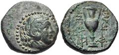 LYDIA, Sardes. Circa 133 BC-AD 14. Æ 15mm (2.62 g, 12h). Head of young Herakles right, wearing lion skin / Kantharos; monogram to lower left and right. Johnston 228-9 var. (monograms) SNG Copenhagen -