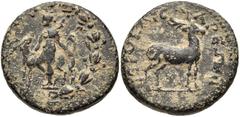 LYDIA, Hierocaesaraea. Pseudo-autonomous issue. 1st-2nd centuries AD. Æ 18mm (4.78 g, 12h). Artemis standing left, holding bow; beside her, stag standing right, head reverted; all within laurel-wreath