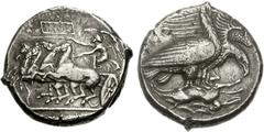 SICILY, Akragas. Circa 409-406 BC. AR Tetradrachm (17.28 g, 9h). Reverse die signed by the artist Silanos. Nike, holding kentron in right hand, reins in left, driving galloping quadriga left; above, t