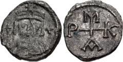 Byzantine Maurice Tiberius. 582-602. AR Quarter Siliqua (11mm, 0.54 g, 5h). Carthage mint. Helmeted and cuirassed facing bust; two crosses flanking / Cruciform monogram. DOC 242 var. (monogram); MIBE 