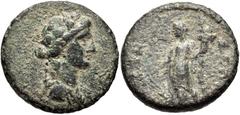 LYDIA, Silandus. Pseudo-autonomous issue. 2nd century AD. Æ 21mm (6.82 g, 6h). Draped bust of youthful Dionysos right, wearing ivy wreath / [CI]ΛAN-ΔEΩN, Tyche standing left, holding rudder and cornuc