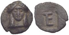 IONIA, Kolophon. Circa 450-410 BC. AR Tetartemorion (6mm, 0.17 g, 1h). Facing head of Apollo / TE (tetartemorion) monogram within incuse square. Milne, Colophon 7; SNG Kayhan 356; SNG von Aulock 1999;